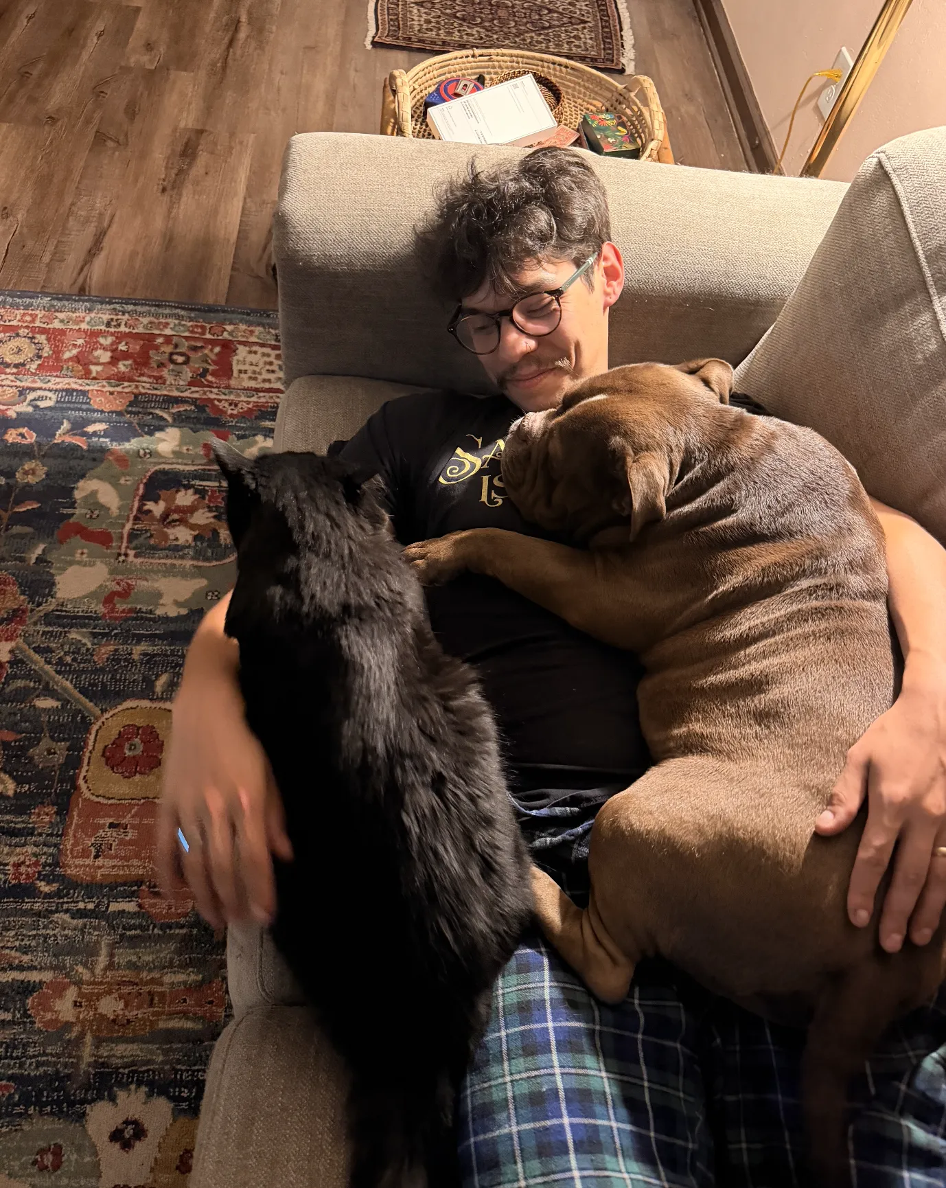 Man with his emotional support cat and emotional support dog in Colorado